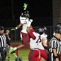 Elias Pearl , #6, of Port Charlotte celebrates a touchdown during a game against Dunbar at Dunbar on Friday, Oct. 10, 2025. Port Charlotte won.