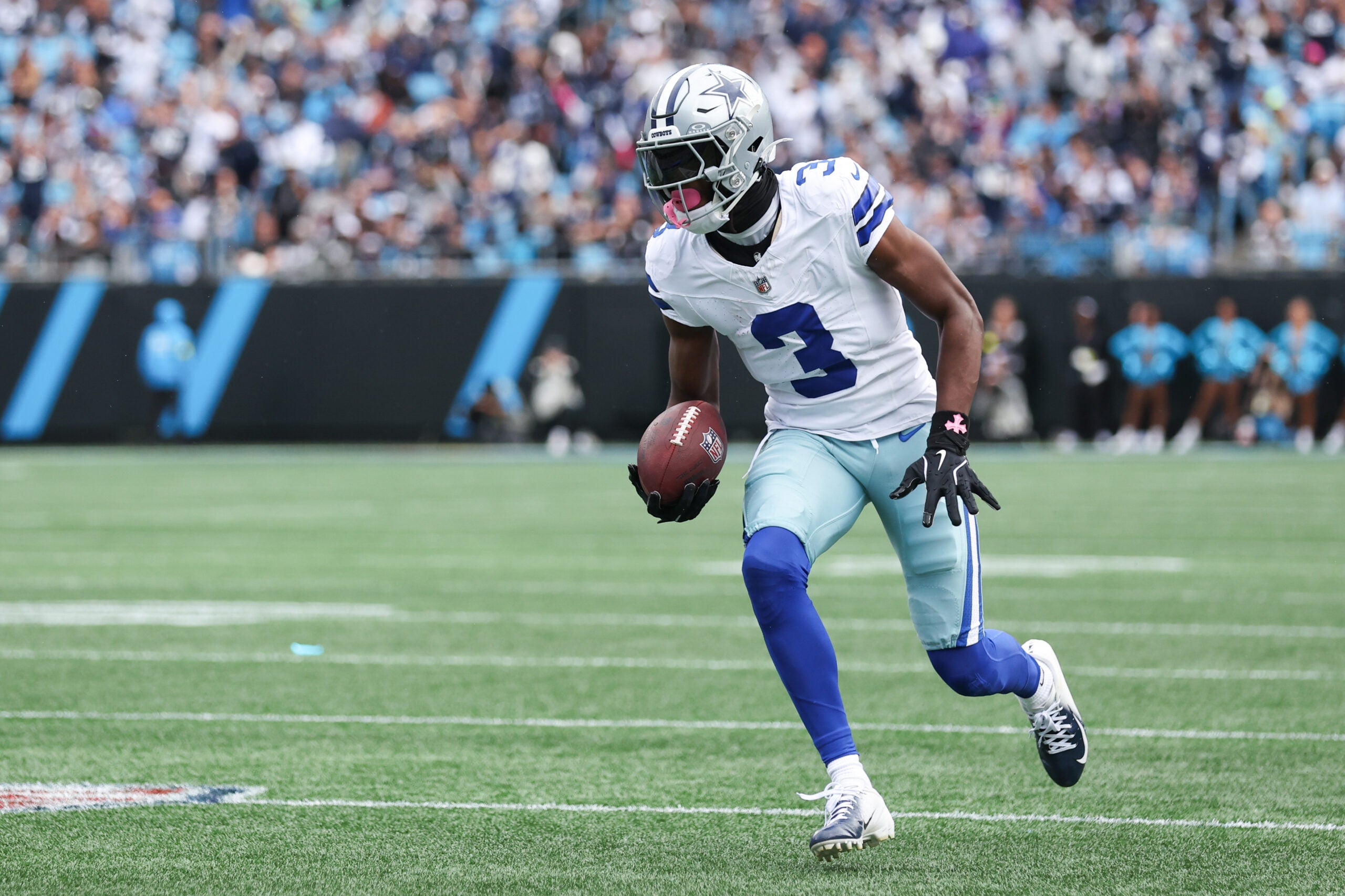 Oct 12, 2025; Charlotte, North Carolina, USA; Dallas Cowboys wide receiver George Pickens (3) runs with the ball during the first quarter against the Carolina Panthers at Bank of America Stadium.