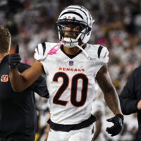 Oct 16, 2025; Cincinnati, Ohio, USA; Cincinnati Bengals cornerback DJ Turner II (20) gestures toward his bench as he walks off the field with an apparent injury against the Pittsburgh Steelers during the third quarter at Paycor Stadium.
