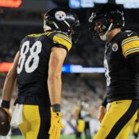 Oct 16, 2025; Cincinnati, Ohio, USA; Pittsburgh Steelers tight end Pat Freiermuth (88) celebrates with quarterback Aaron Rodgers (8) after scoring a touchdown against the Cincinnati Bengals during the third quarter at Paycor Stadium.