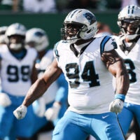 Oct 19, 2025; East Rutherford, New Jersey, USA; Carolina Panthers defensive end A'Shawn Robinson (94) reacts after a sack in the second quarter against the New York Jets at MetLife Stadium.