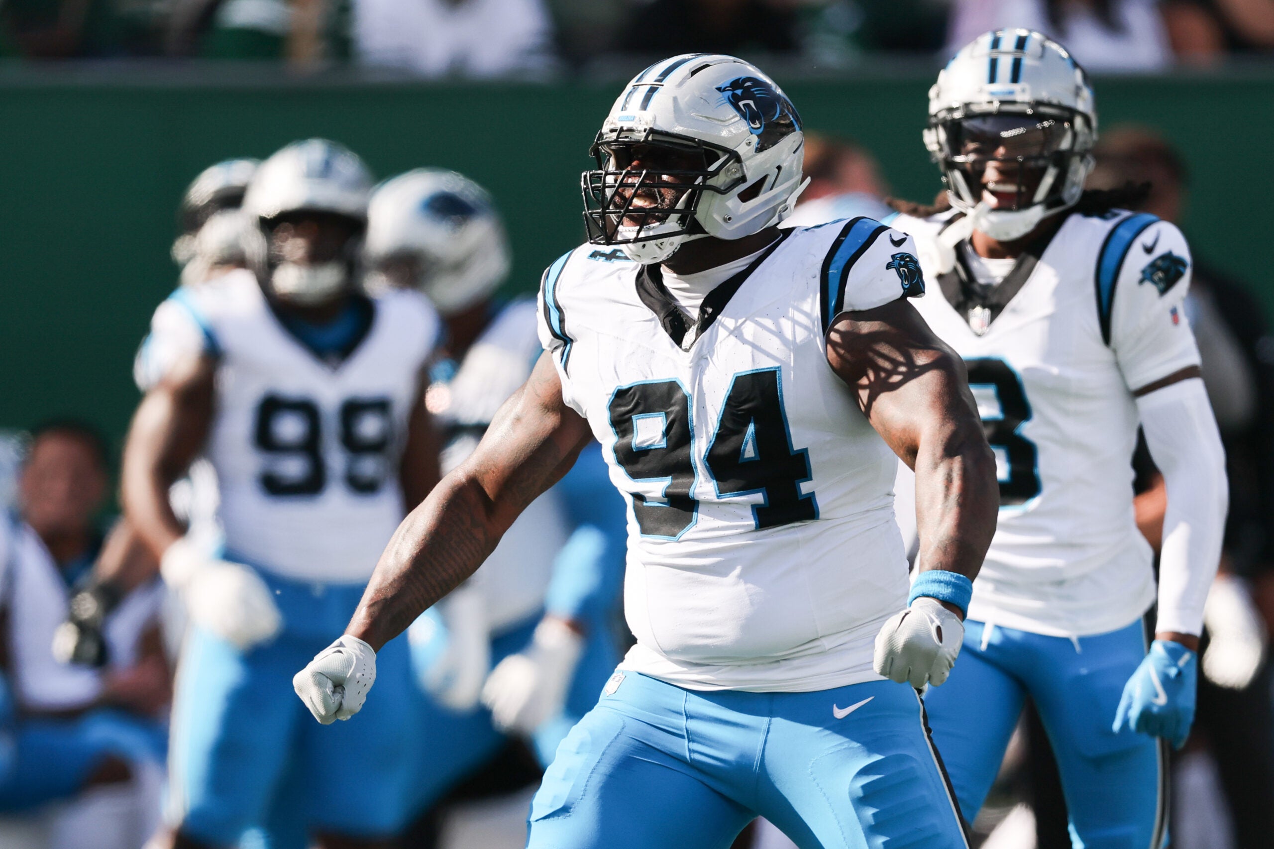 Oct 19, 2025; East Rutherford, New Jersey, USA; Carolina Panthers defensive end A'Shawn Robinson (94) reacts after a sack in the second quarter against the New York Jets at MetLife Stadium.