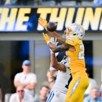 Oct 19, 2025; Inglewood, California, USA; Los Angeles Chargers cornerback Benjamin St-Juste (24) breaks up a pass intended for Indianapolis Colts wide receiver Alec Pierce (14) in the first half at SoFi Stadium.