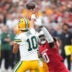 Oct 19, 2025; Glendale, Arizona, USA; Green Bay Packers quarterback Jordan Love (10) passes while being rushed by Arizona Cardinals outside linebacker Josh Sweat (10) during the second half at State Farm Stadium.