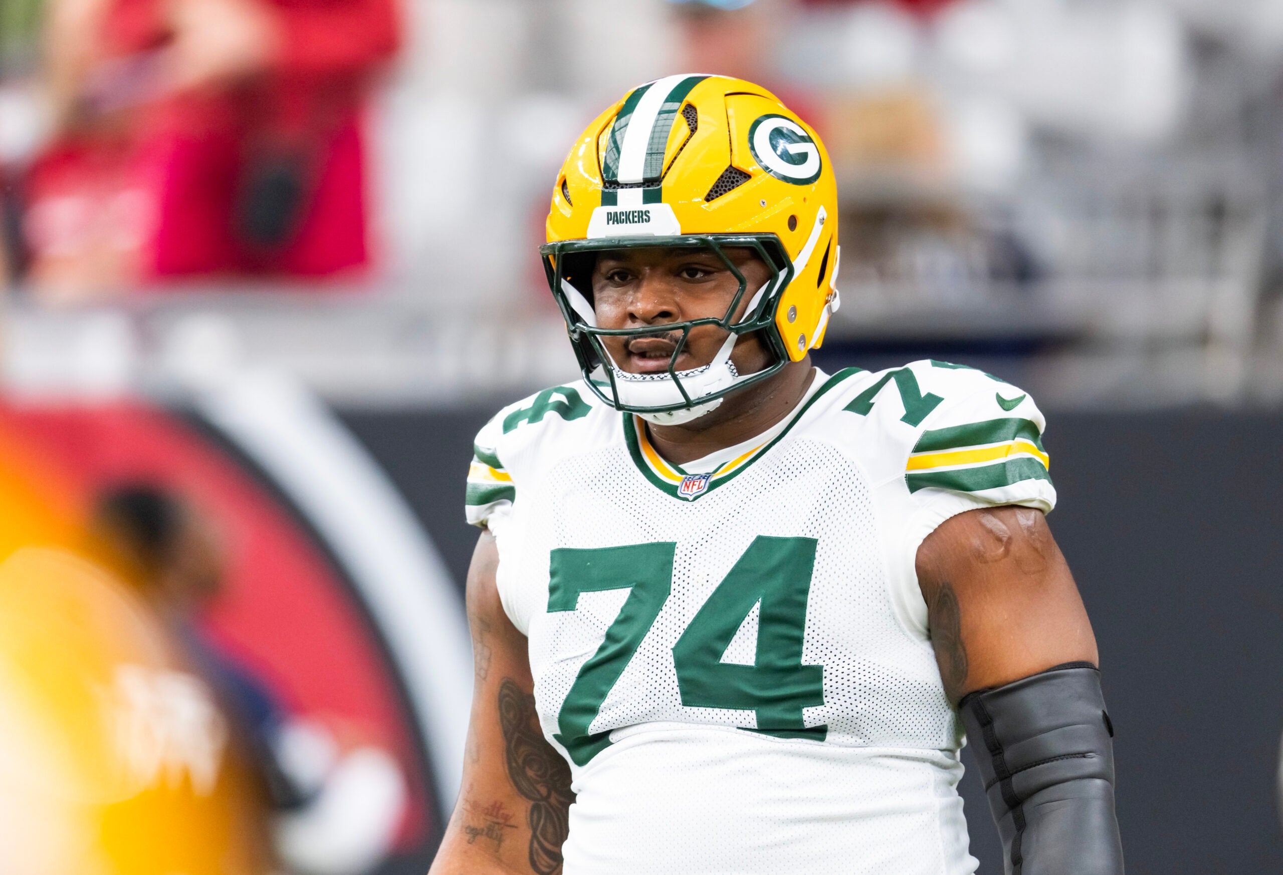 Oct 19, 2025; Glendale, Arizona, USA; Green Bay Packers center Elgton Jenkins (74) against the Arizona Cardinals at State Farm Stadium.