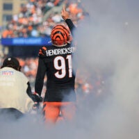 Oct 26, 2025; Cincinnati, Ohio, USA; Cincinnati Bengals defensive end Trey Hendrickson (91) runs out to the field before the game against the New York Jets at Paycor Stadium.