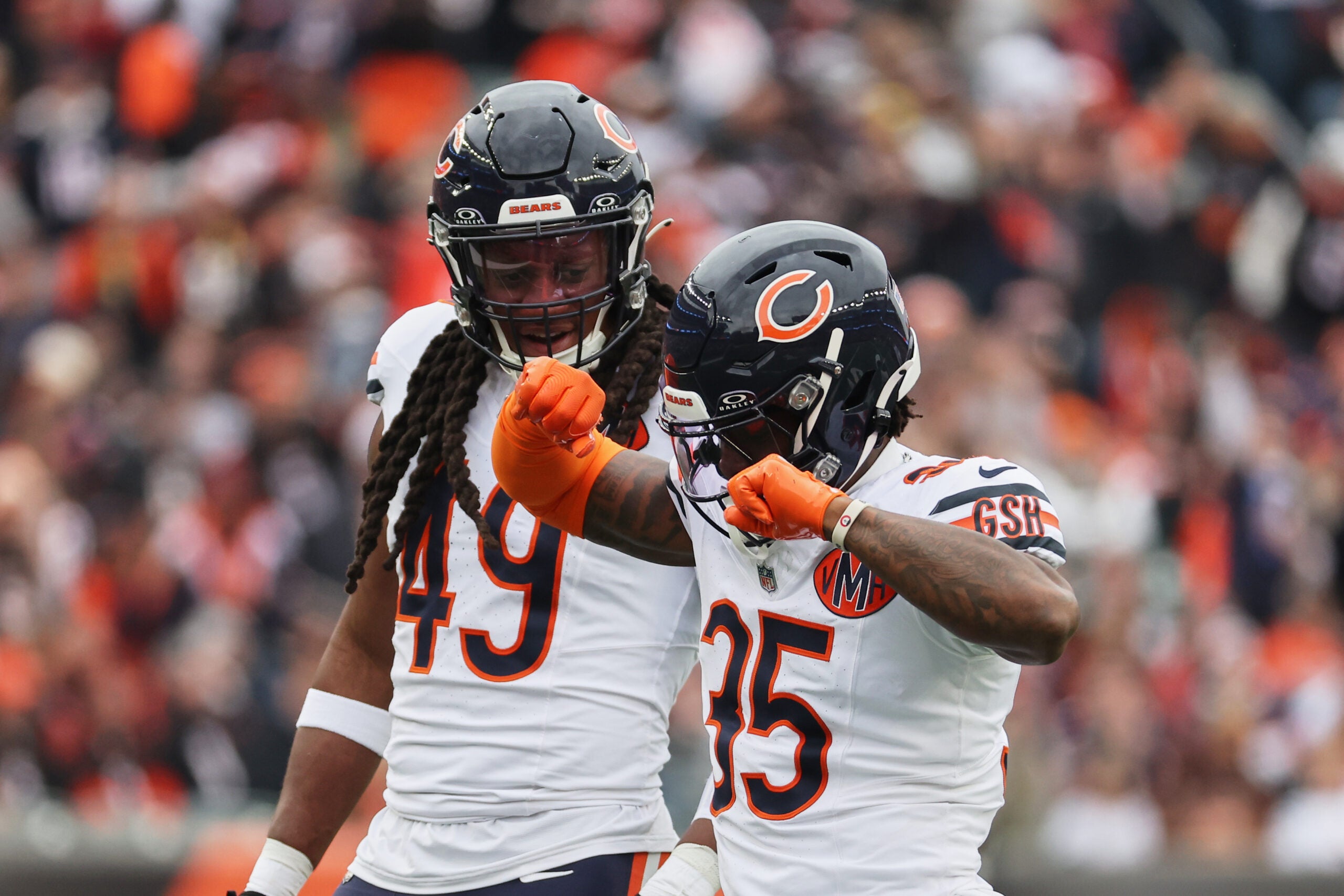 Nov 2, 2025; Cincinnati, Ohio, USA; Chicago Bears safety C.J. Gardner-Johnson (35) celebrates with linebacker Tremaine Edmunds (49) after sacking Cincinnati Bengals quarterback Joe Flacco (not pictured) during the second quarter at Paycor Stadium.