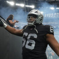 Nov 2, 2025; Paradise, Nevada, USA; Las Vegas Raiders guard Dylan Parham (66) greets fans during the game against the Jacksonville Jaguars at Allegiant Stadium.