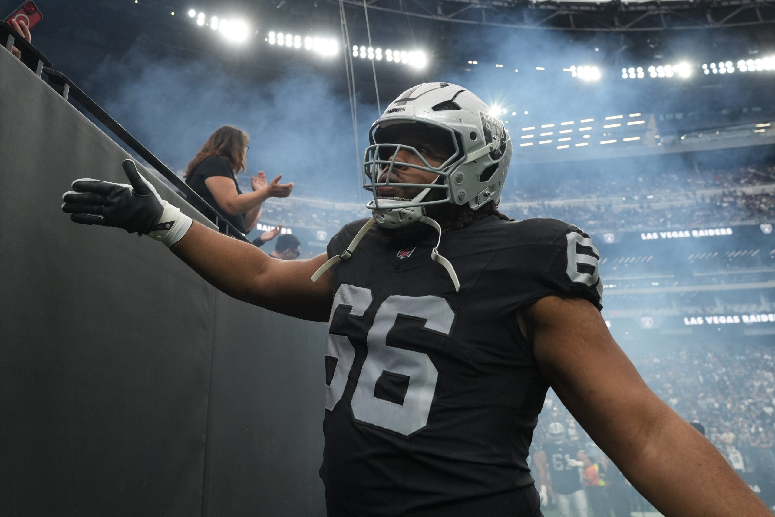 Nov 2, 2025; Paradise, Nevada, USA; Las Vegas Raiders guard Dylan Parham (66) greets fans during the game against the Jacksonville Jaguars at Allegiant Stadium.