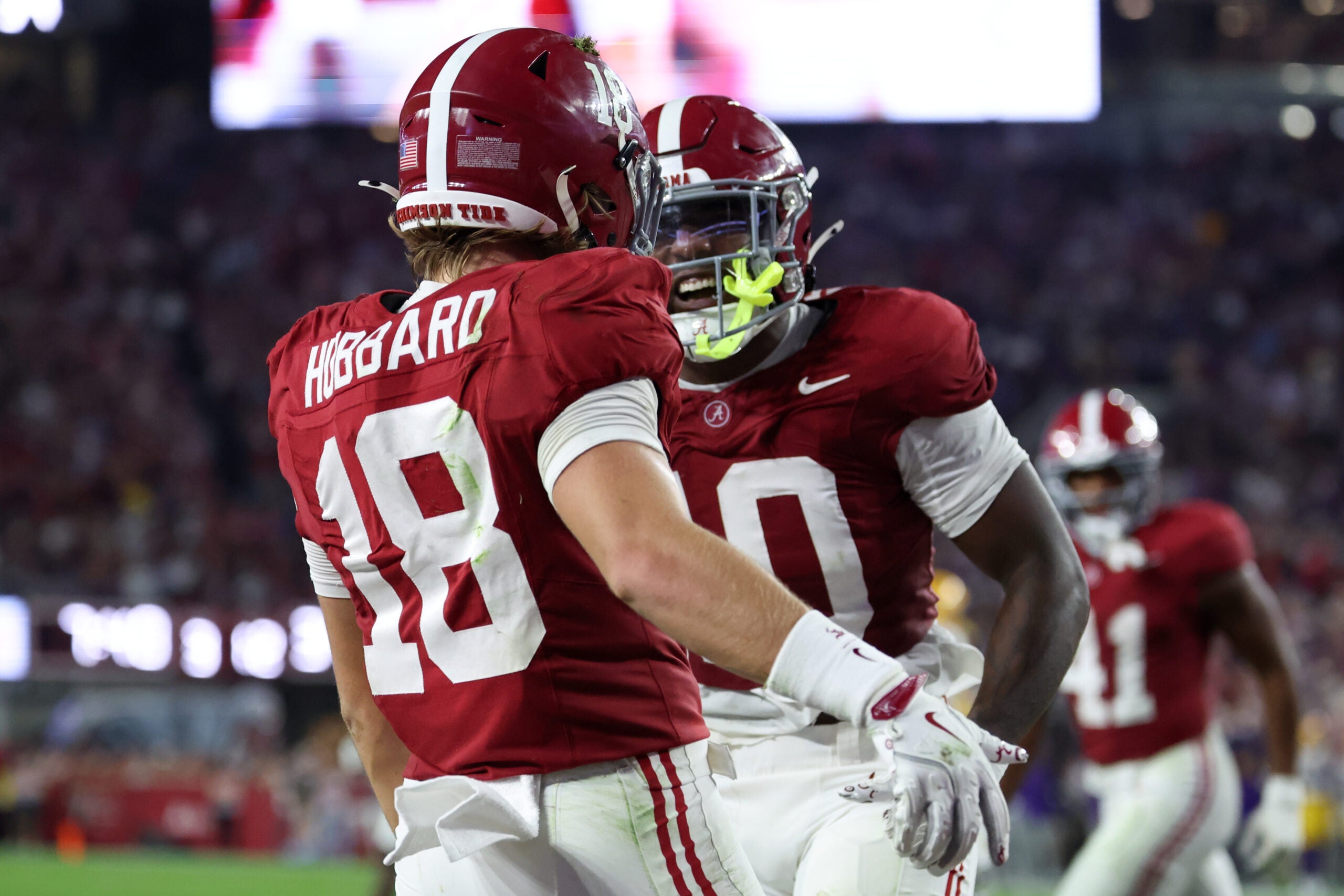 Nov 8, 2025; Tuscaloosa, Alabama, USA; Alabama Crimson Tide defensive back Bray Hubbard (18) and linebacker Justin Jefferson (10) celebrate after a play against the Louisiana State Tigers during the second quarter of the game at Saban Field at Bryant-Denny Stadium.