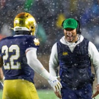 Nov 8, 2025; South Bend, Indiana, USA; Notre Dame Fighting Irish head coach Marcus Freeman celebrates with running back Aneyas Williams (22) after he scored a touchdown against the Navy Midshipmen during the second half at Notre Dame Stadium. Mandatory Credit: Michael Caterina-Imagn Images