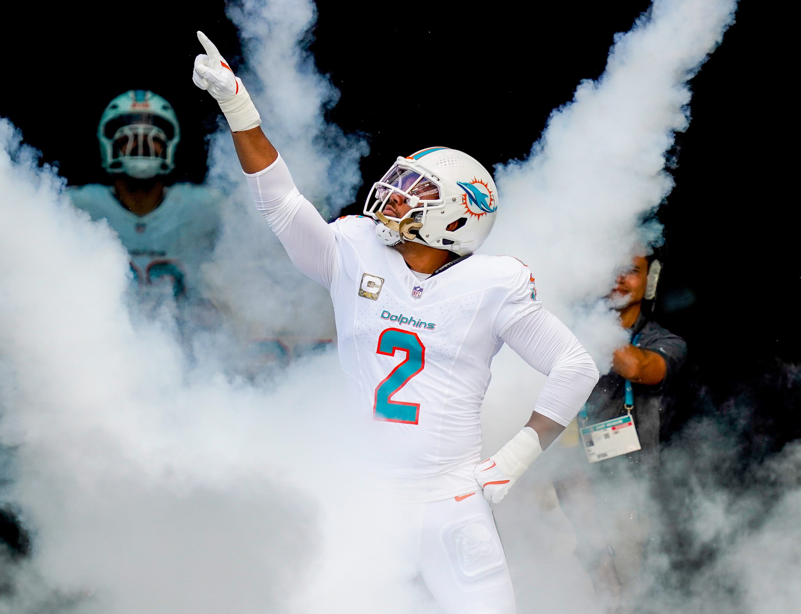 Nov 9, 2025; Miami Gardens, Florida, USA; Miami Dolphins outside linebacker Bradley Chubb (2) runs on the field before a game against the Buffalo Bills at Hard Rock Stadium.