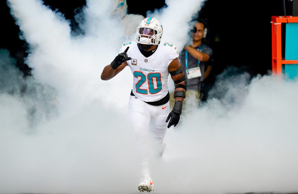 Nov 9, 2025; Miami Gardens, Florida, USA; Miami Dolphins linebacker Jordyn Brooks (20) runs on the field before a game against the Buffalo Bills at Hard Rock Stadium.