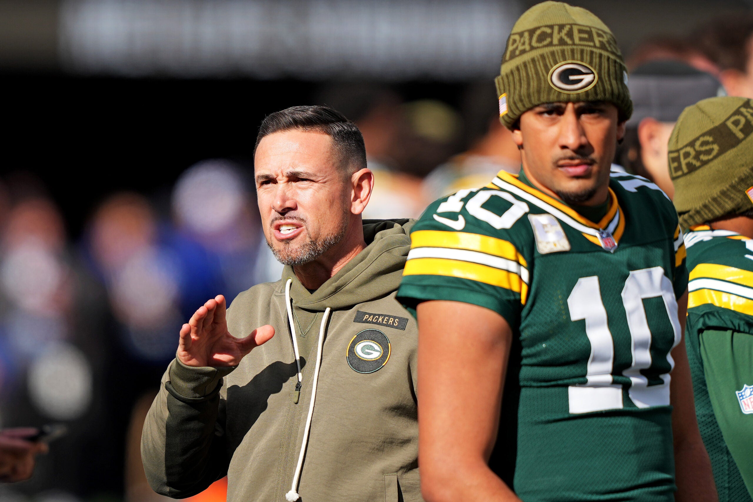 Nov 16, 2025; East Rutherford, New Jersey, USA; Green Bay Packers head coach Matt LaFleur and quarterback Jordan Love (10) before the game against the New York Giants at MetLife Stadium.