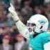 Nov 16, 2025; Madrid, Spain; Miami Dolphins linebacker Bradley Chubb (2) reacts after a play against the Washington Commanders in the fourth quarter during the 2025 NFL Madrid Game at Santiago Bernabeu Stadium.