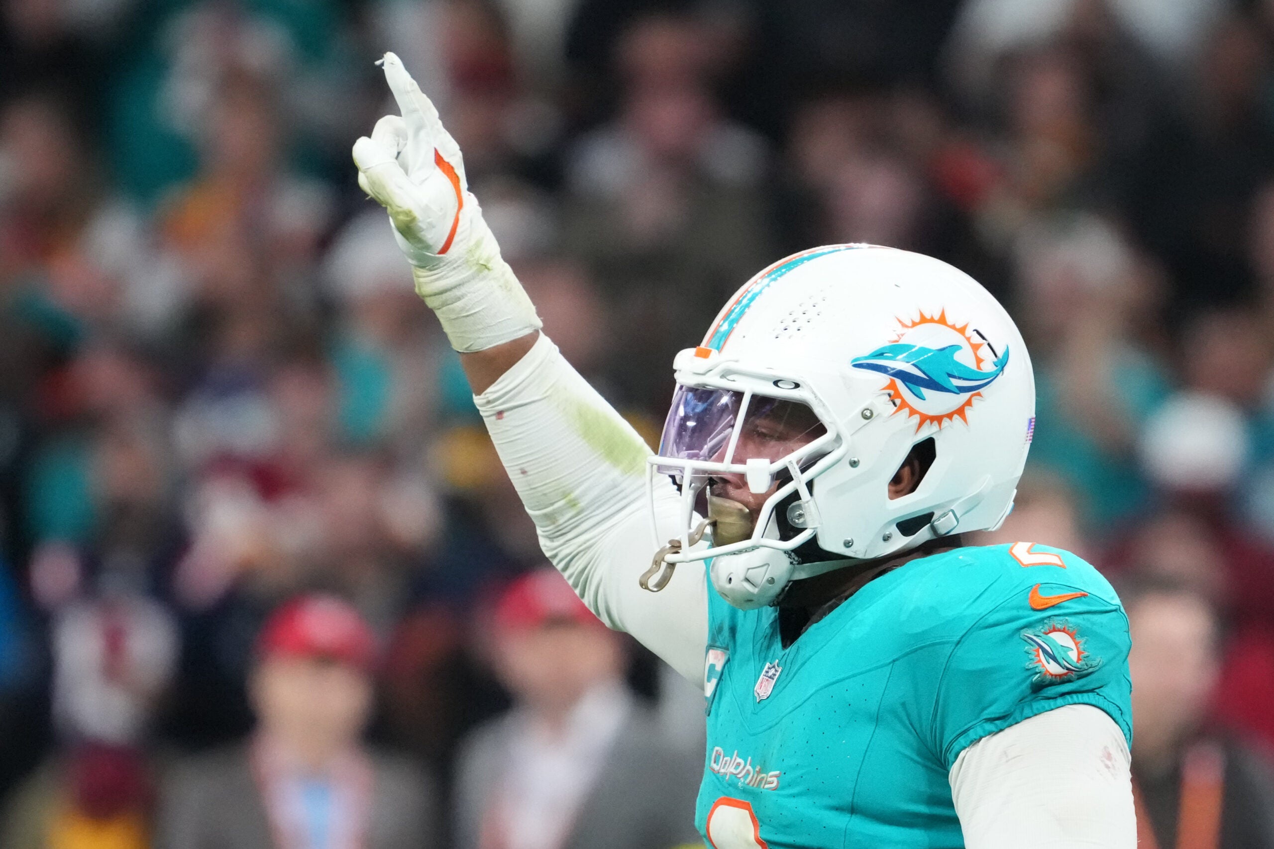 Nov 16, 2025; Madrid, Spain; Miami Dolphins linebacker Bradley Chubb (2) reacts after a play against the Washington Commanders in the fourth quarter during the 2025 NFL Madrid Game at Santiago Bernabeu Stadium.