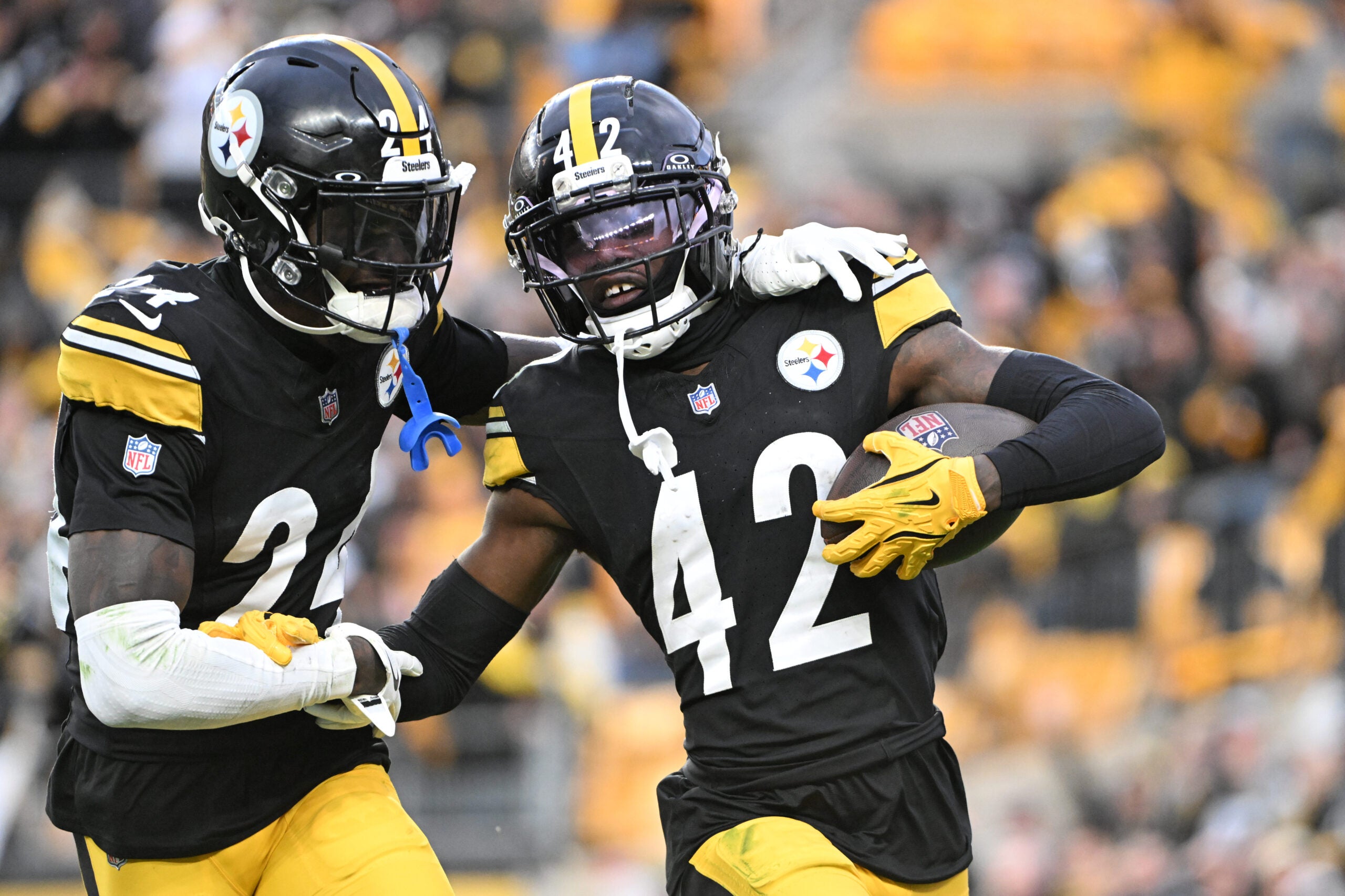 Nov 16, 2025; Pittsburgh, Pennsylvania, USA; Pittsburgh Steelers cornerback James Pierre (42) celebrates with cornerback Joey Porter Jr. (24) after scoring a touchdown against the Cincinnati Bengals during the fourth quarter at Acrisure Stadium.