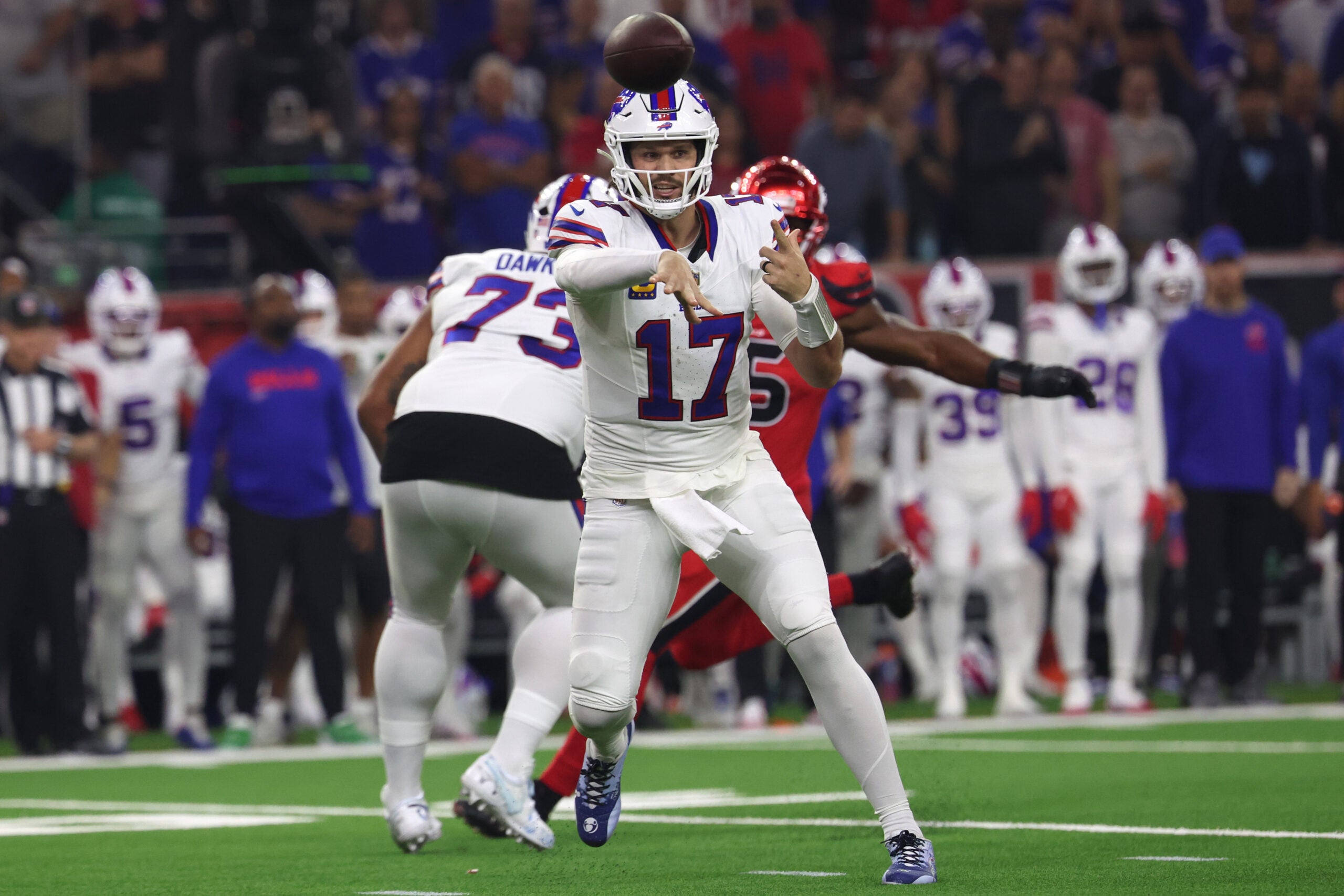Nov 20, 2025; Houston, Texas, USA; Buffalo Bills quarterback Josh Allen (17) throws a pass against the Houston Texans in the first quarter at NRG Stadium.