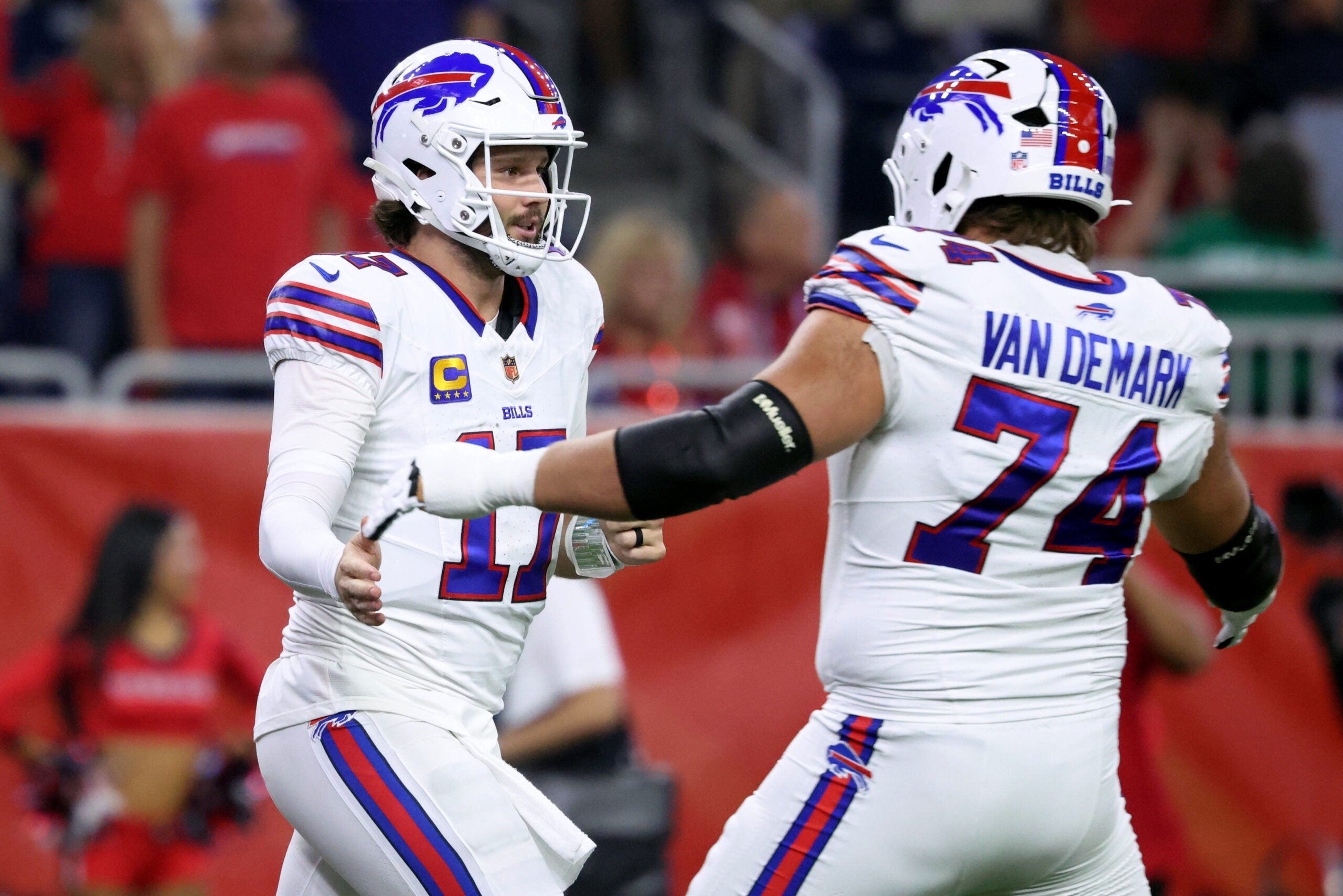Nov 20, 2025; Houston, Texas, USA; Buffalo Bills quarterback Josh Allen (17) celebrates with offensive tackle Ryan Van Demark (74) after a touchdown against the Houston Texans in the first quarter at NRG Stadium.