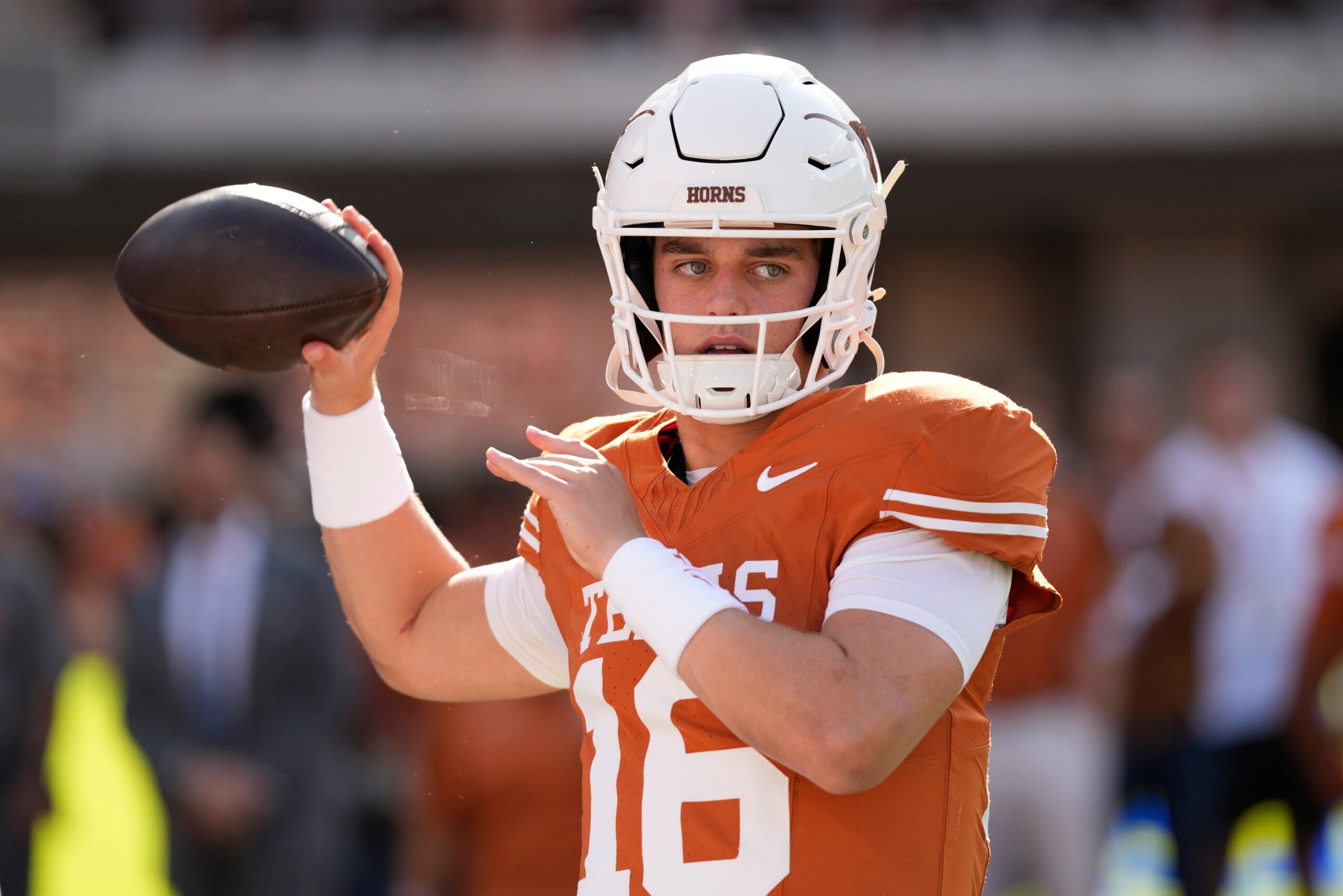 Nov 22, 2025; Austin, Texas, USA; Texas Longhorns quarterback Arch Manning (16) warms up before a game against the Arkansas Razorbacks at Darrell K Royal-Texas Memorial Stadium. Mandatory Credit: Scott Wachter-Imagn Images