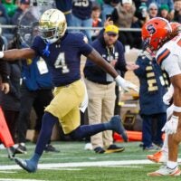 Notre Dame running back Jeremiyah Love (4) runs the ball into the end zone for a touchdown in the first half of a NCAA football game against Syracuse at Notre Dame Stadium on Saturday, Nov. 22, 2025, in South Bend.