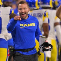 Nov 23, 2025; Inglewood, California, USA; Los Angeles Rams head coach Sean McVay congratulates cornerback Cobie Durant (14) after an interception for a touchdown in the first half against the Tampa Bay Buccaneers at SoFi Stadium.