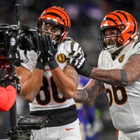 Nov 27, 2025; Baltimore, Maryland, USA; Cincinnati Bengals wide receiver Andrei Iosivas (80) celebrates with guard Dalton Risner (66) after sowing a second half touchdown against the Baltimore Ravens at M&T Bank Stadium.