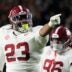 Nov 29, 2025; Auburn, Alabama, USA; Alabama defensive lineman James Smith (23) celebrates his sack of Auburn quarterback Ashton Daniels (12) at Jordan-Hare Stadium.