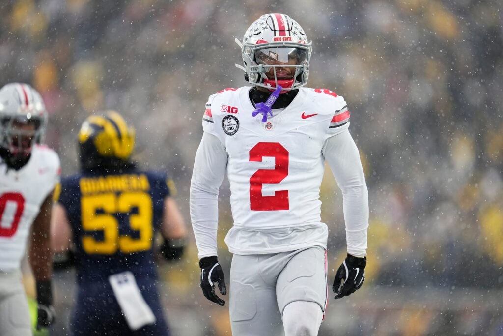 Ohio State Buckeyes defensive back Caleb Downs (2) celebrates during the NCAA football game against the Michigan Wolverines at Michigan Stadium in Ann Arbor, Mich. on Nov. 29, 2025. Ohio State won 27-9.