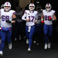 Nov 30, 2025; Pittsburgh, Pennsylvania, USA; Buffalo Bills center Connor McGovern (66) and quarterback Josh Allen (17) and tight end Dawson Knox (88) take the field to warm up against the Pittsburgh Steelers at Acrisure Stadium.