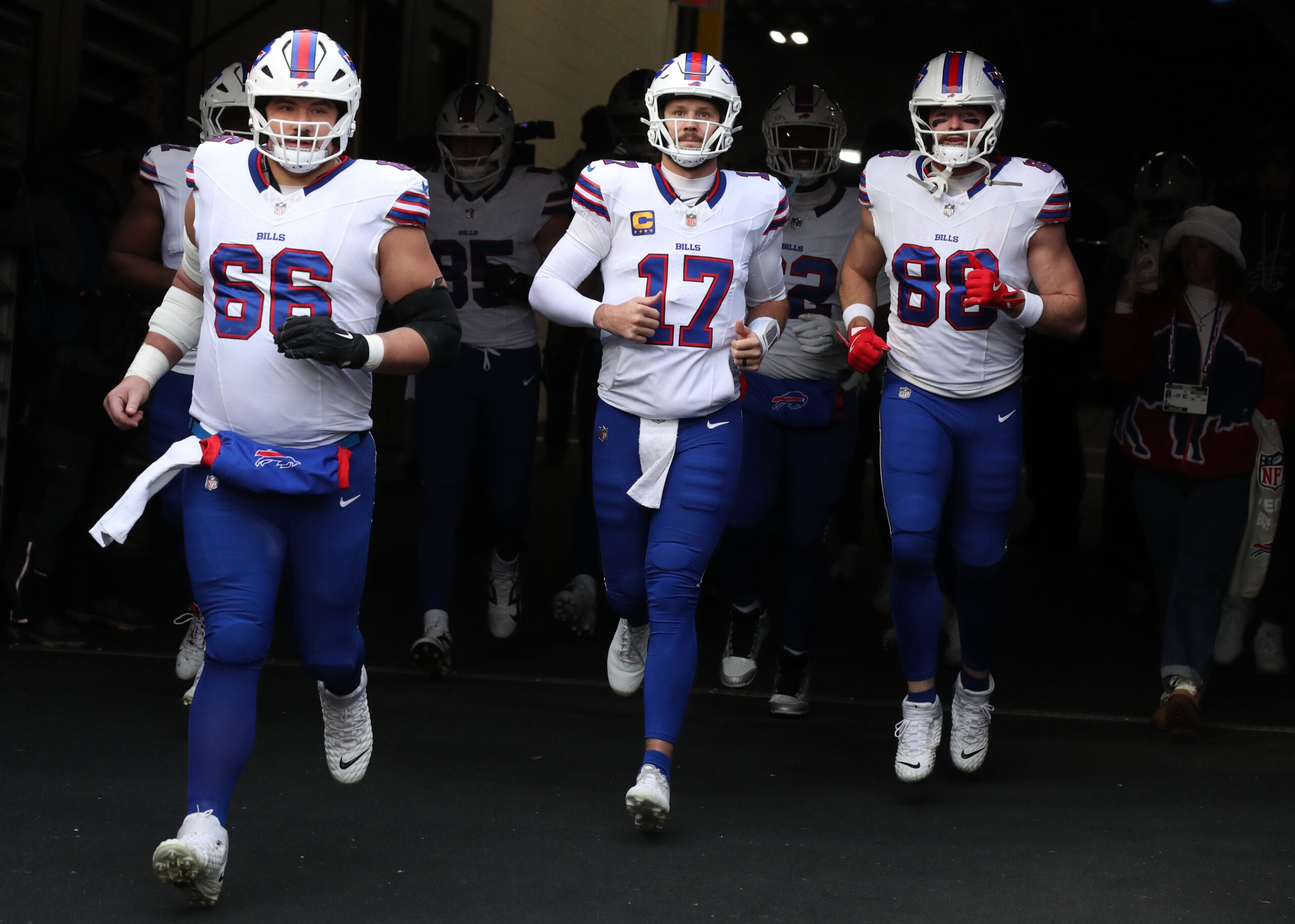 Nov 30, 2025; Pittsburgh, Pennsylvania, USA; Buffalo Bills center Connor McGovern (66) and quarterback Josh Allen (17) and tight end Dawson Knox (88) take the field to warm up against the Pittsburgh Steelers at Acrisure Stadium.