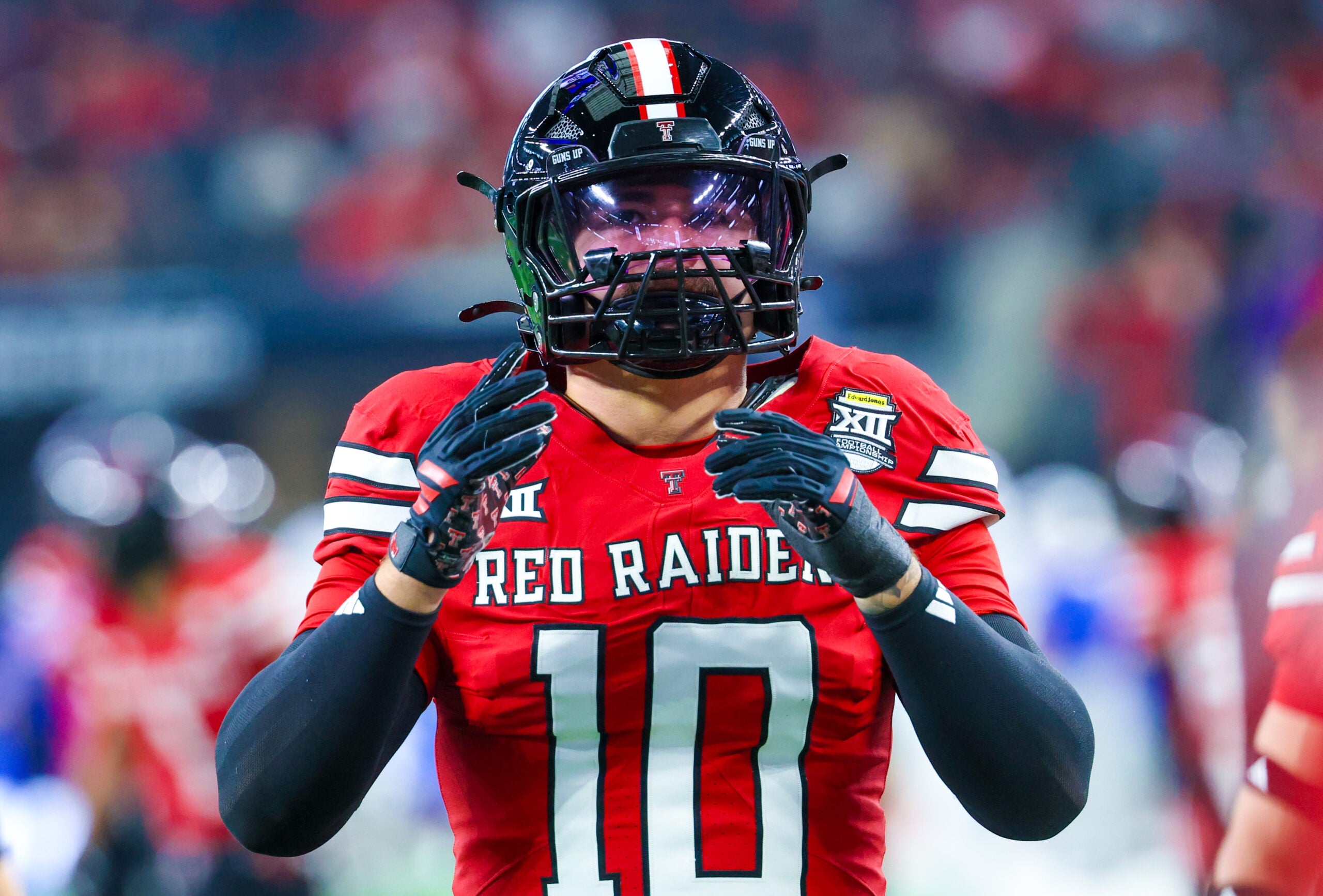 Dec 6, 2025; Arlington, TX, USA; Texas Tech Red Raiders linebacker Jacob Rodriguez (10) warms up before the game against the BYU Cougars at AT&T Stadium.