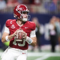 Dec 6, 2025; Atlanta, GA, USA; Alabama Crimson Tide quarterback Ty Simpson (15) looks to pass during the fourth quarter against the Georgia Bulldogs during the 2025 SEC Championship game at Mercedes-Benz Stadium.