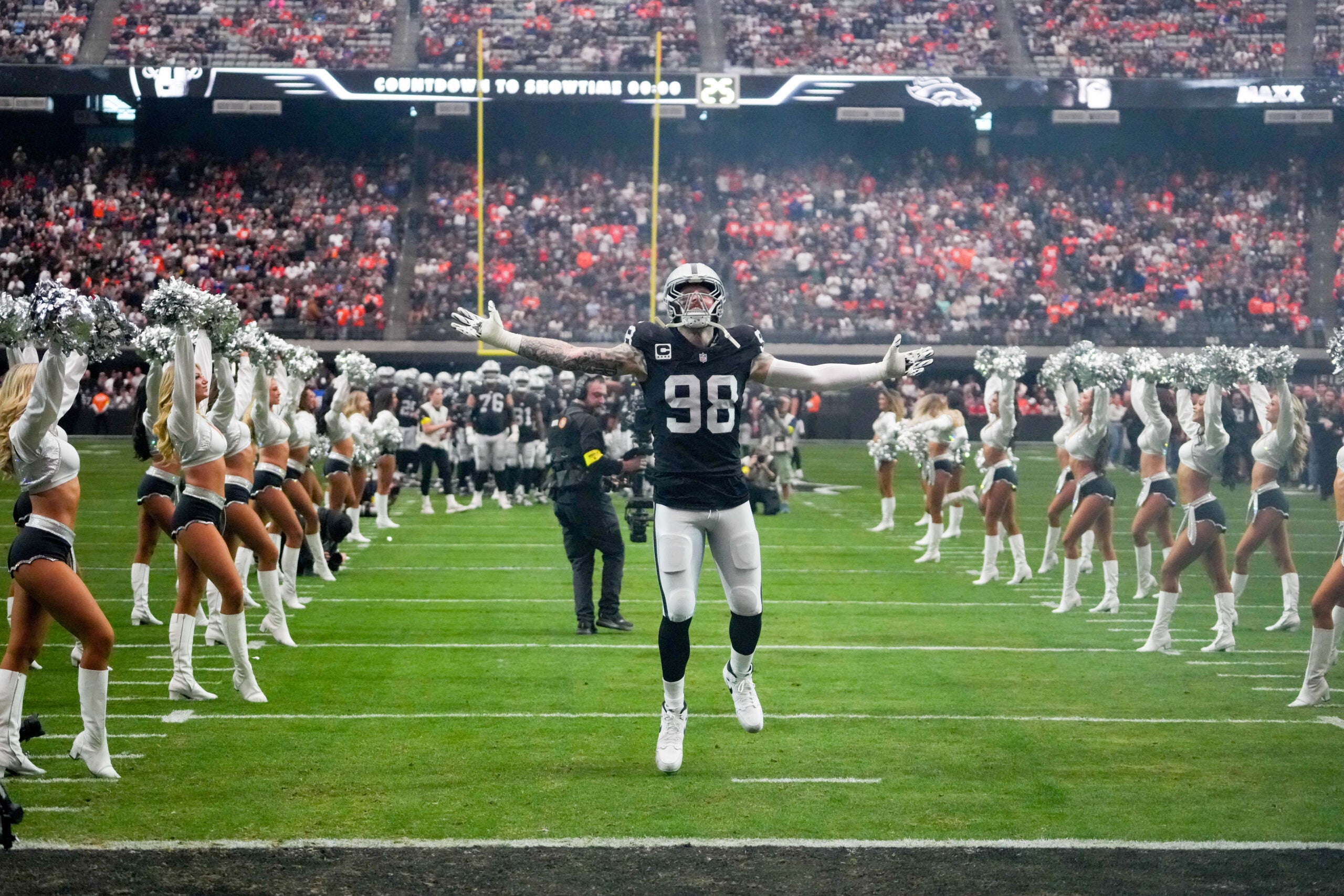 Dec 7, 2025; Paradise, Nevada, USA; Las Vegas Raiders defensive end Maxx Crosby (98) takes the field prior to a game against the Denver Broncos at Allegiant Stadium.