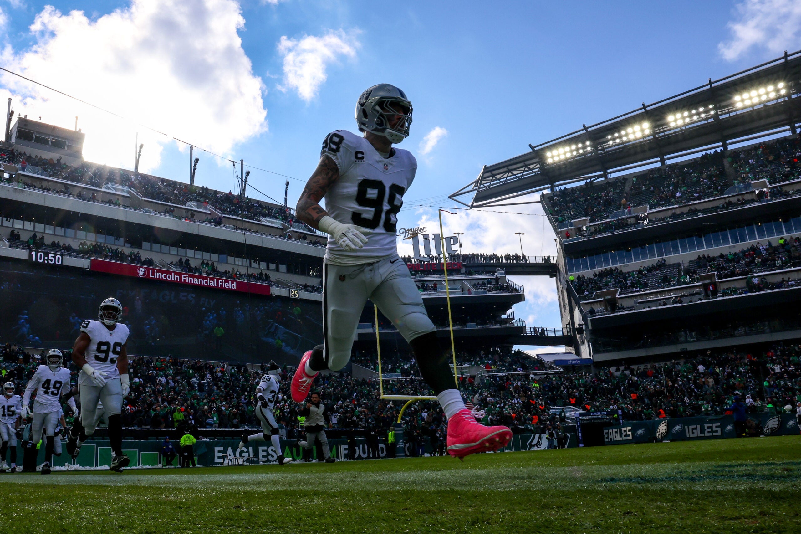 Las Vegas Raiders defensive end edge rusher Maxx Crosby trade Baltimore Ravens keep him