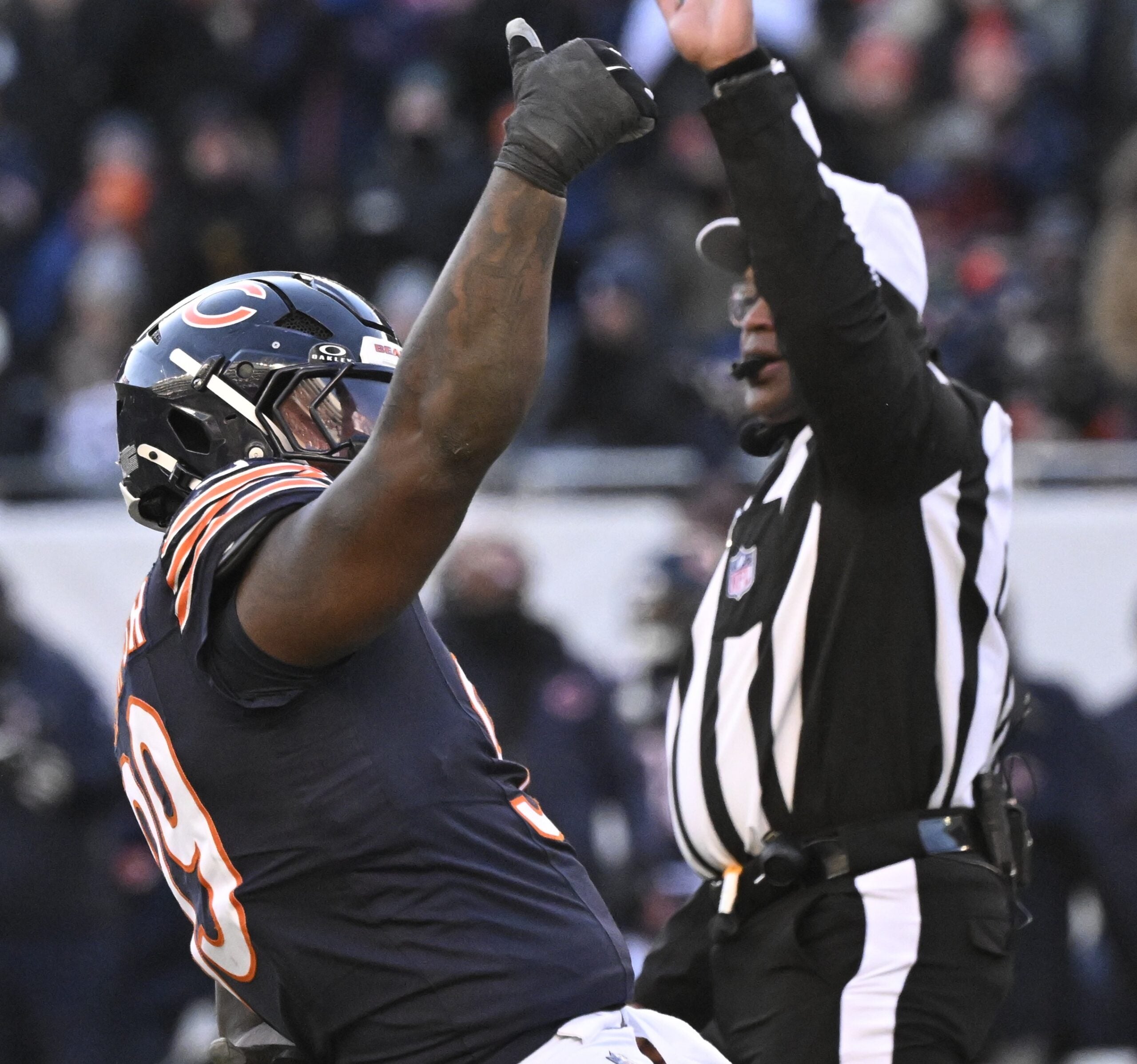 Dec 14, 2025; Chicago, Illinois, USA; Chicago Bears defensive tackle Gervon Dexter Sr. (99) celebrates after sacking Cleveland Browns quarterback Shedeur Sanders (12) during the fourth quarter at Soldier Field.