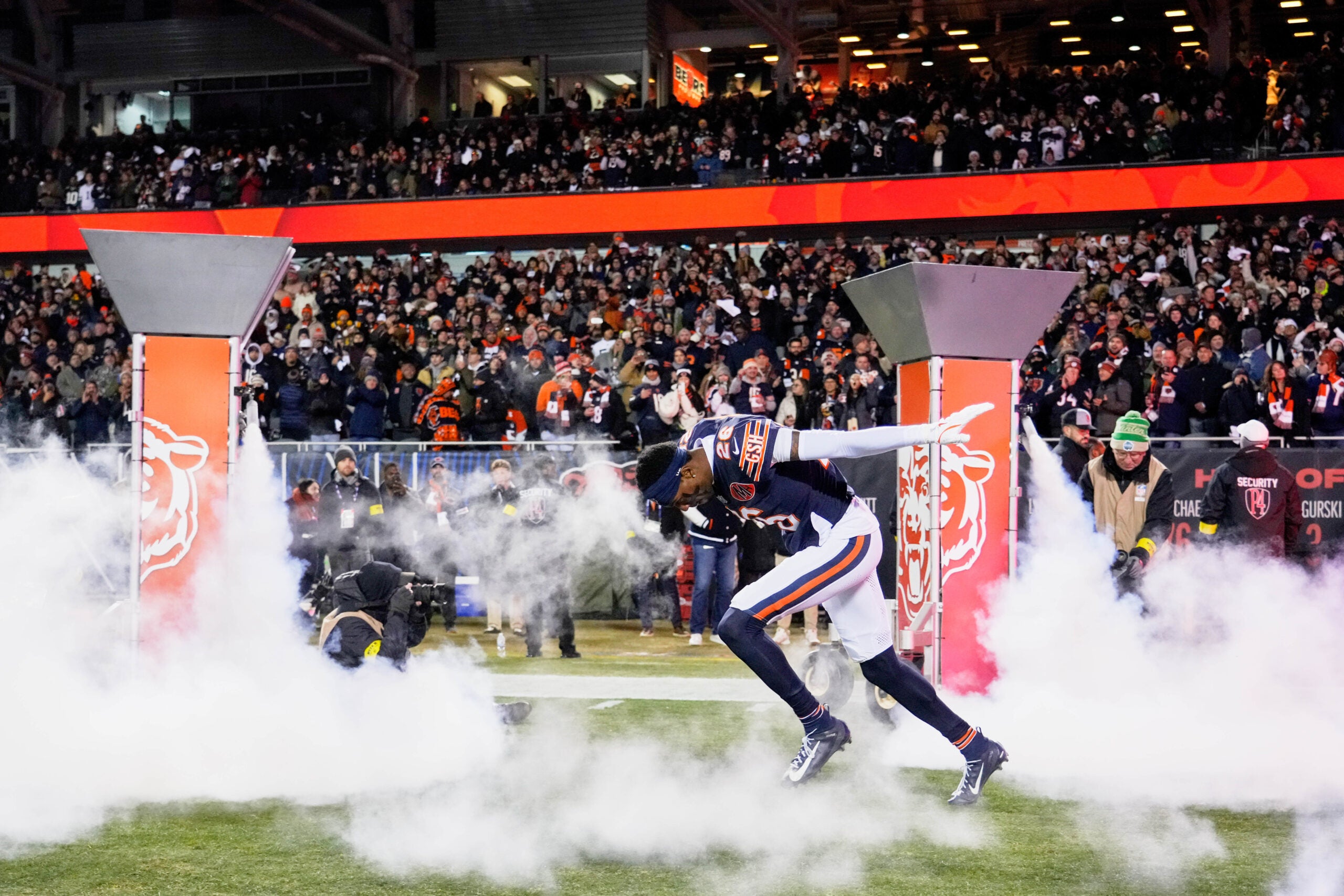 Dec 20, 2025; Chicago, Illinois, USA; Chicago Bears cornerback Nahshon Wright (26) runs onto the field during player introductions before the game against the Green Bay Packers at Soldier Field.