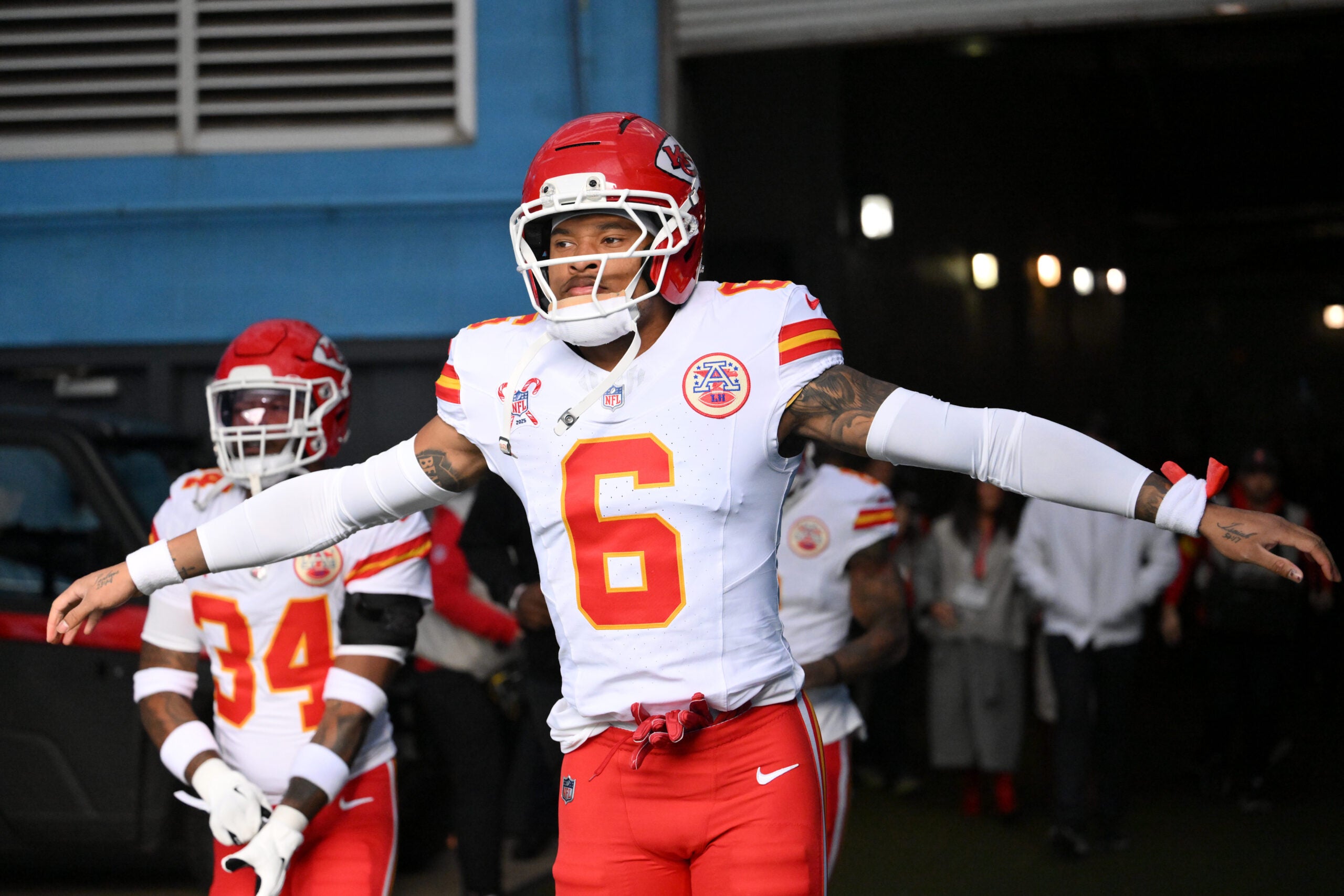 Dec 21, 2025; Nashville, Tennessee, USA; Kansas City Chiefs safety Bryan Cook (6) runs to the field against the Tennessee Titans during pre-game warmups at Nissan Stadium.