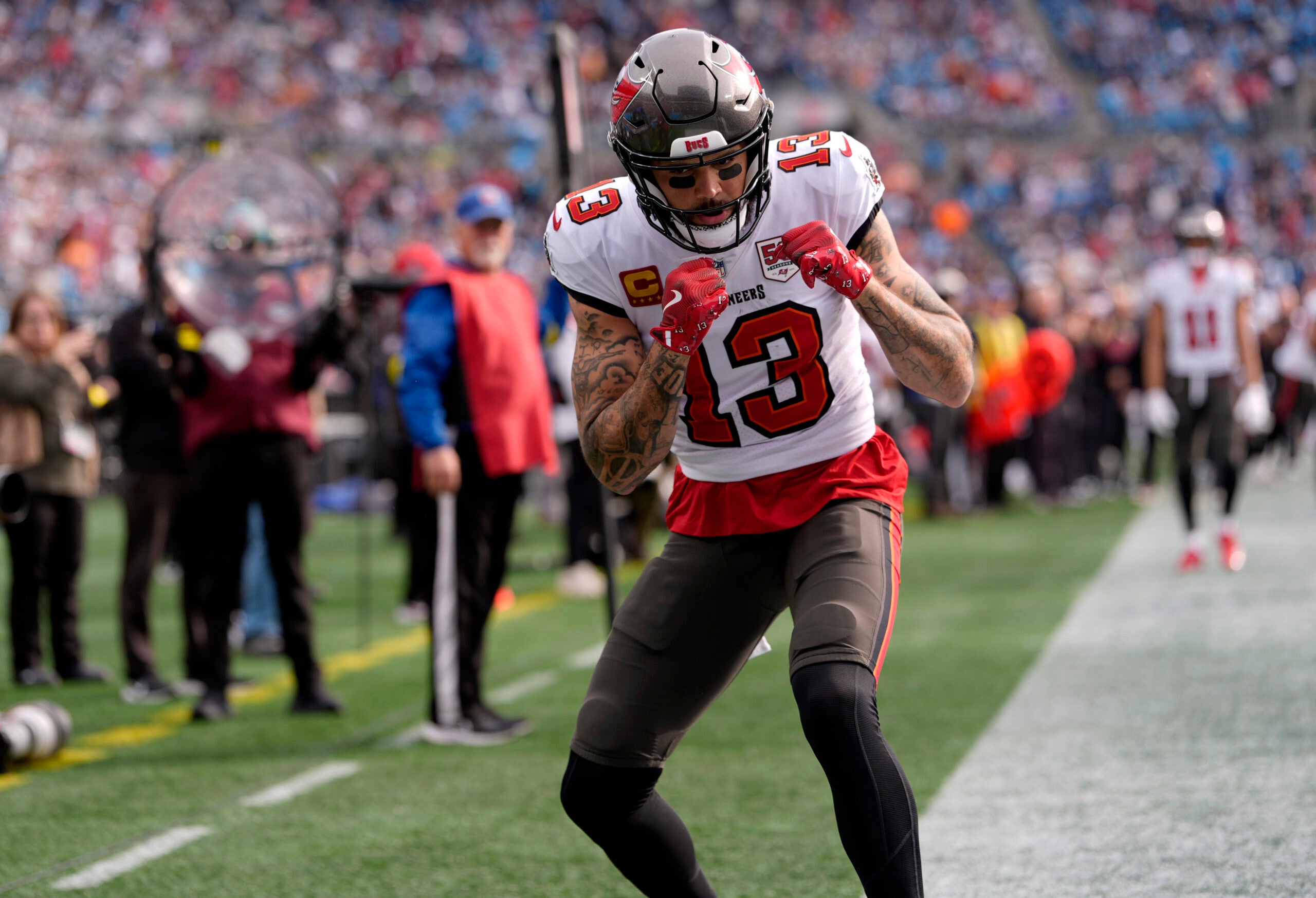 Dec 21, 2025; Charlotte, North Carolina, USA; Tampa Bay Buccaneers wide receiver Mike Evans (13) reacts a touchdown during the first half against the Carolina Panthers at Bank of America Stadium.