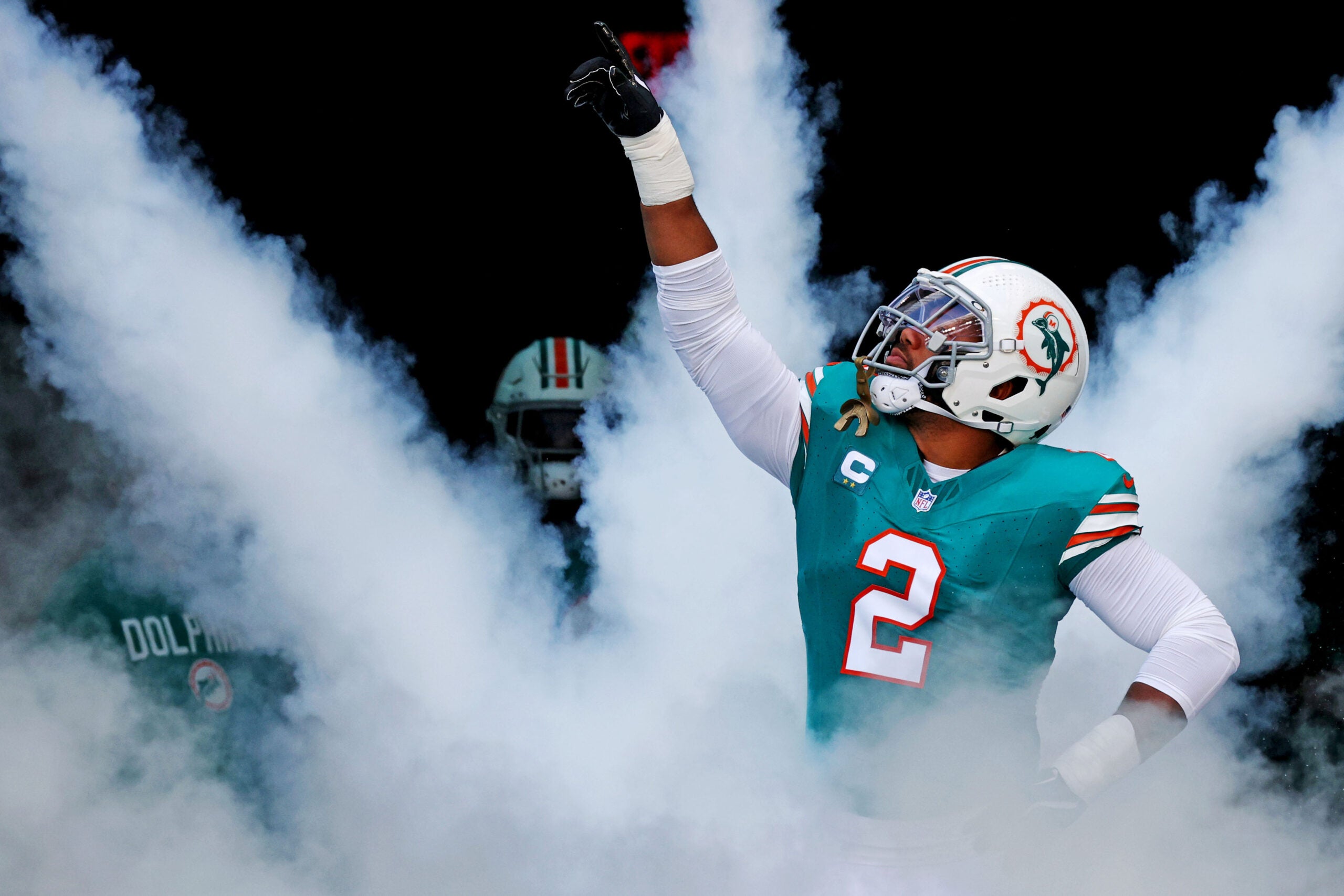 Dec 21, 2025; Miami Gardens, Florida, USA; Miami Dolphins linebacker Bradley Chubb (2) runs on the field at the start of the game against the Cincinnati Bengals at Hard Rock Stadium.