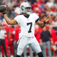 Dec 21, 2025; Houston, Texas, USA; Las Vegas Raiders quarterback Geno Smith (7) passes against the Houston Texans during the second quarter at NRG Stadium.