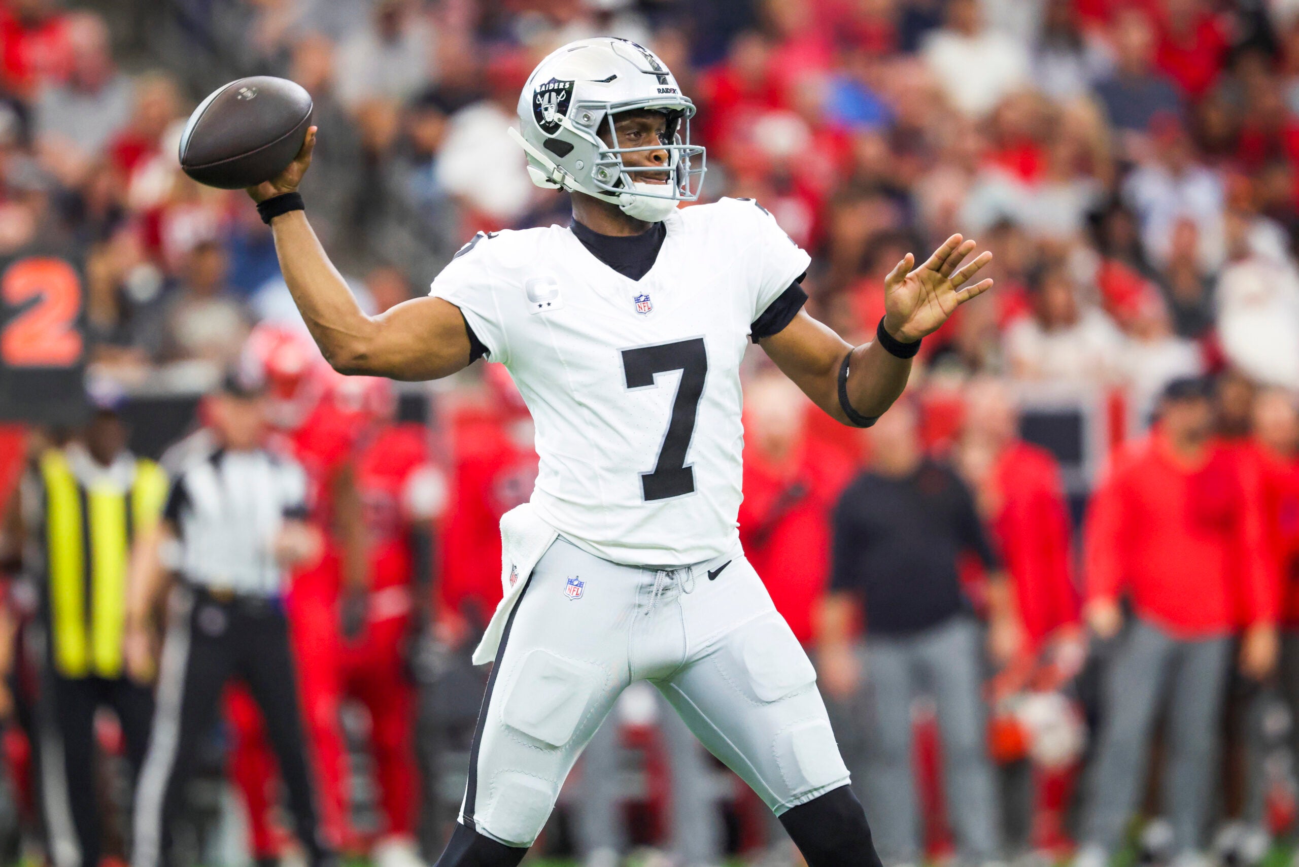 Dec 21, 2025; Houston, Texas, USA; Las Vegas Raiders quarterback Geno Smith (7) passes against the Houston Texans during the second quarter at NRG Stadium.