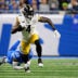 Dec 21, 2025; Detroit, Michigan, USA; Detroit Lions cornerback Rock Ya-Sin (23) tackles Pittsburgh Steelers wide receiver DK Metcalf (4) during the fourth quarter at Ford Field.