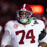 Dec 19, 2025; Norman, OK, USA; Alabama Crimson Tide offensive lineman Kadyn Proctor (74) against the Oklahoma Sooners during the CFP National Playoff First Round at Gaylord Family Oklahoma Memorial Stadium.