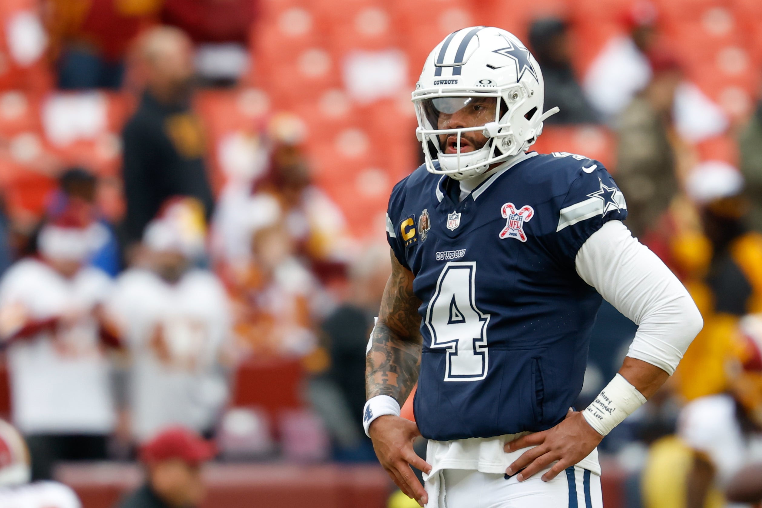 Dec 25, 2025; Landover, Maryland, USA; Dallas Cowboys quarterback Dak Prescott (4) looks on during warmups before the game against the Washington Commanders at Northwest Stadium.