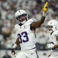Dec 25, 2025; Minneapolis, Minnesota, USA; Minnesota Vikings running back Aaron Jones Sr. (33) celebrates after scoring a touchdown against the Detroit Lions in the first quarter at U.S. Bank Stadium.