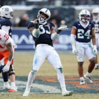 Dec 27, 2025; Bronx, NY, USA; Penn State Nittany Lions defensive end Dani Dennis-Sutton (33) celebrates after a sack against the Clemson Tigers during the second half of the 2025 Pinstripe Bowl at Yankee Stadium.