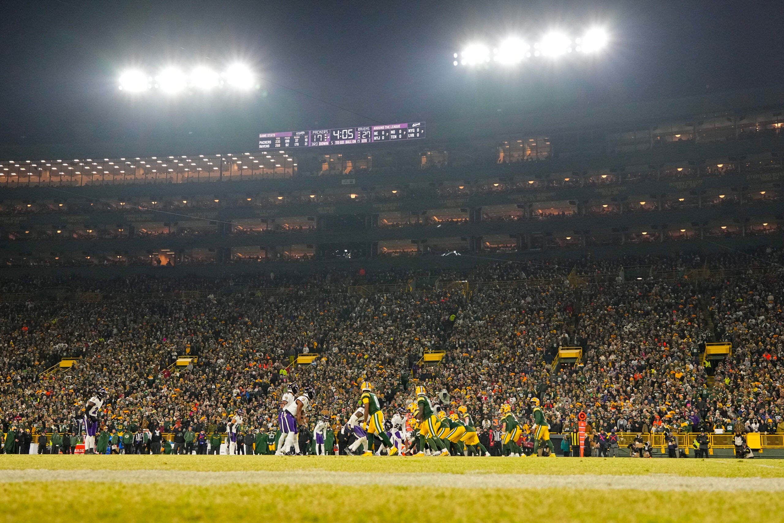 Dec 27, 2025; Green Bay, Wisconsin, USA; The Green Bay Packers line up for a play during the third quarter against the Baltimore Ravens at Lambeau Field.