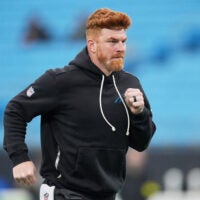 Dec 28, 2025; Charlotte, North Carolina, USA; Carolina Panthers quarterback Andy Dalton (14) warms up before the game against the Seattle Seahawks at Bank of America Stadium.