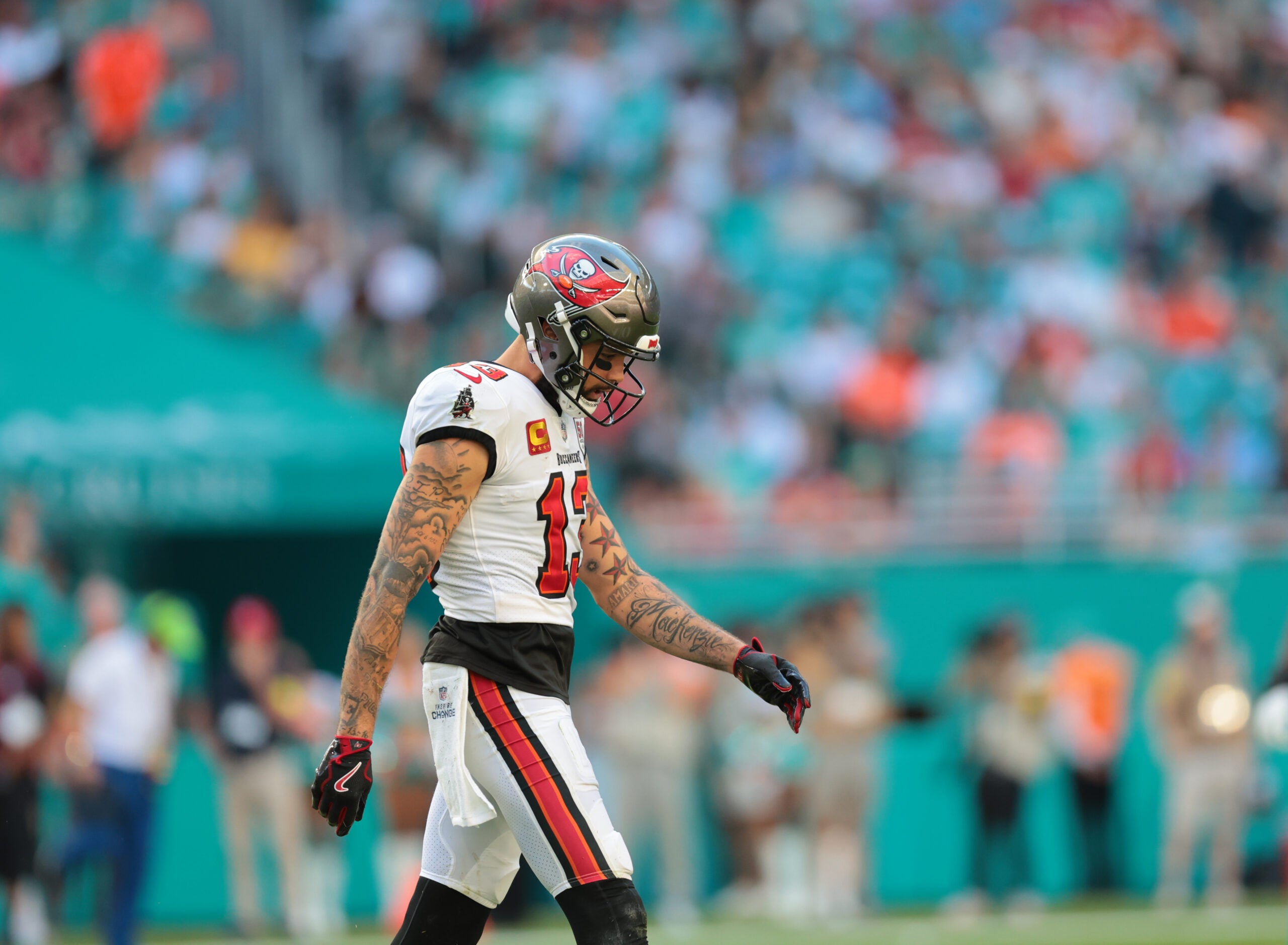 Dec 28, 2025; Miami Gardens, Florida, USA; Tampa Bay Buccaneers wide receiver Mike Evans (13) walks on the field during the fourth quarter against the Miami Dolphins at Hard Rock Stadium.